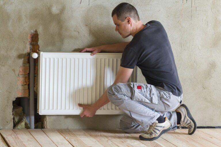 young handsome professional plumber worker install 2023 11 27 04 53 42 utc 1024x683 1 768x512