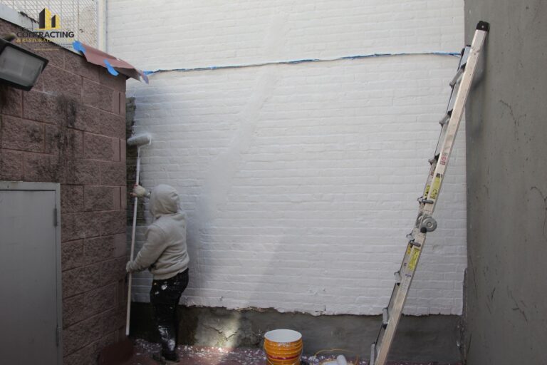 exterior wall shining after full waterproofing and repairs 768x512