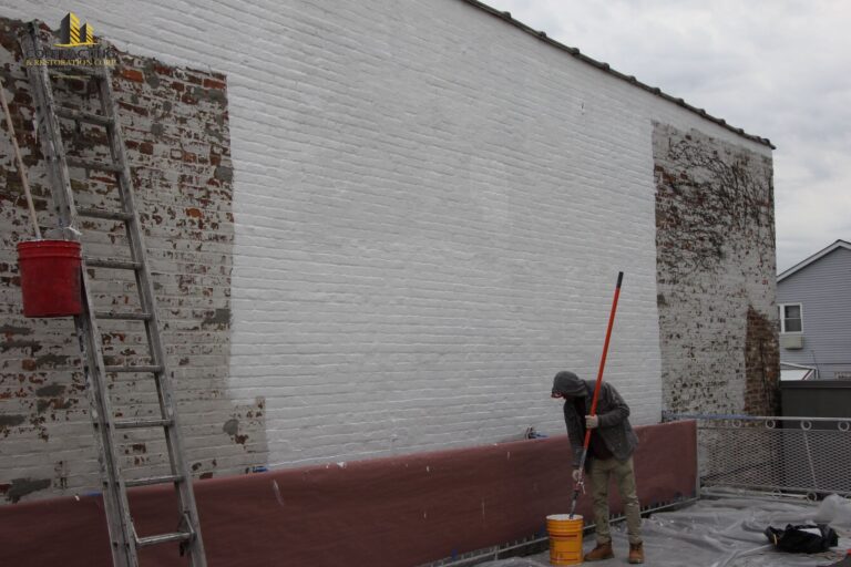 fresh coat of waterproof paint giving a wall a new life 768x512