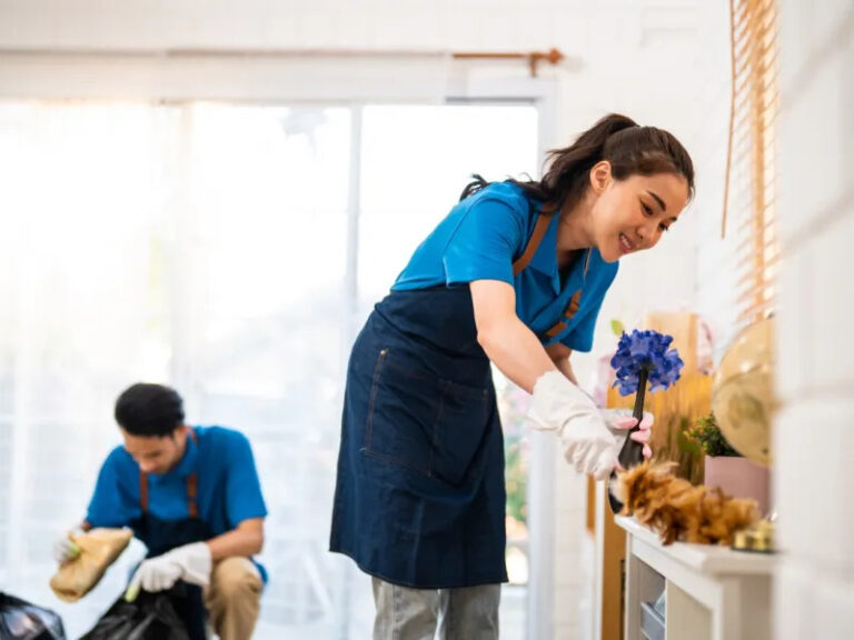 young man and woman cleaning house for sale 1 768x576